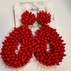 Vintage style red beaded earrings.